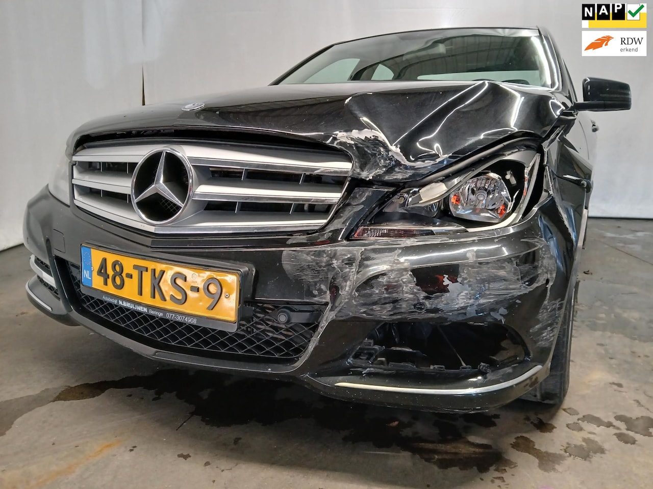 Mercedes-Benz C-klasse - 180 CDI Premium Edition - Airco - Leder - Parkeersens. - Frontschade - AutoWereld.nl