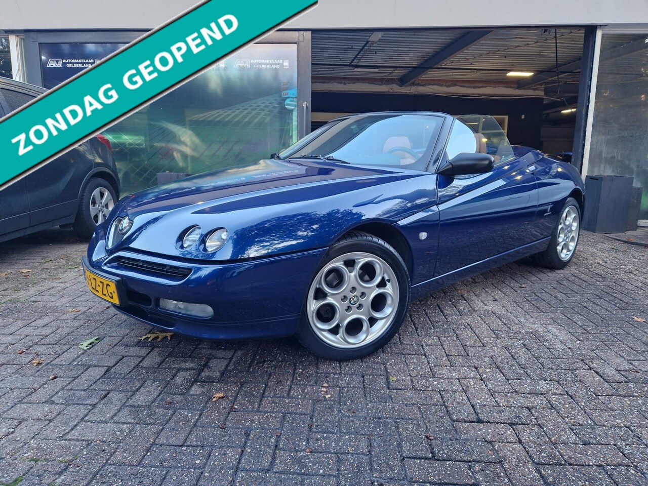 Alfa Romeo Spider - 2.0-16V T.Spark | 2E EIGENAAR | YOUNGTIMER | NL AUTO | LAGE KM | AIRCO | - AutoWereld.nl