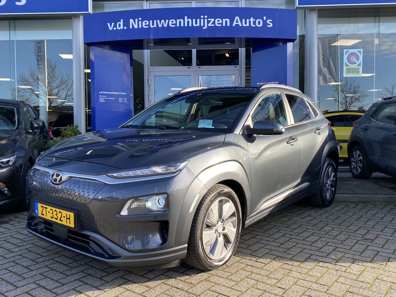 Hyundai Kona Electric - EV Premium 64 kWh | Camera | Leder | Cruise | Info Bas: 0492-588982 - AutoWereld.nl