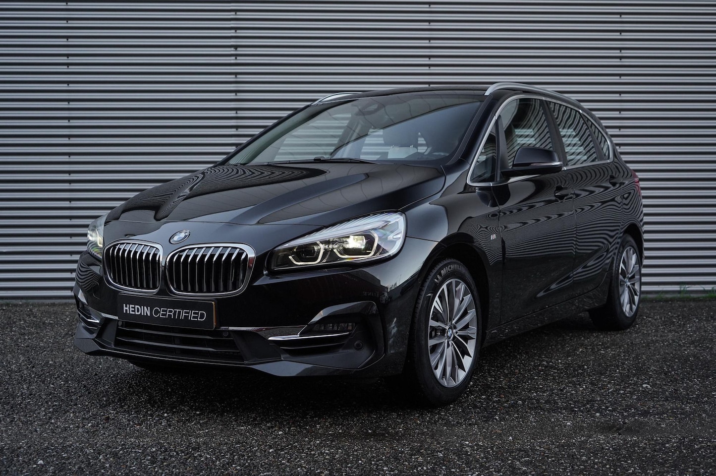 BMW 2-serie Active Tourer - 218i High Executive / Luxury Line / Navigatie / Lederen bekleding /Stoelverwarming voor / - AutoWereld.nl