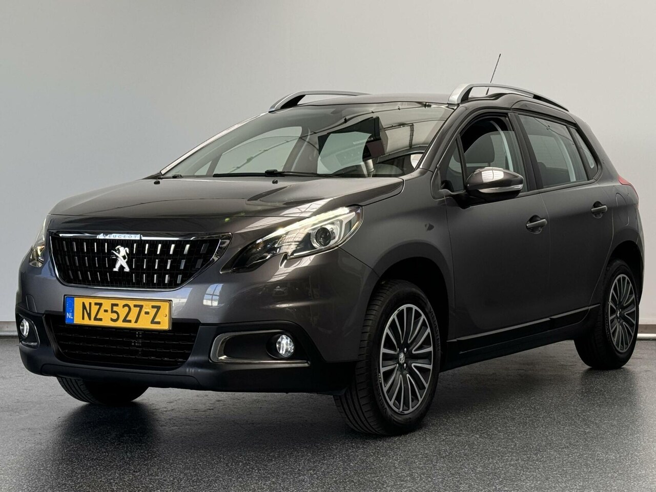 Peugeot 2008 - 1.2 PureTech Blue Lion | Pano | Camera | Navi - AutoWereld.nl