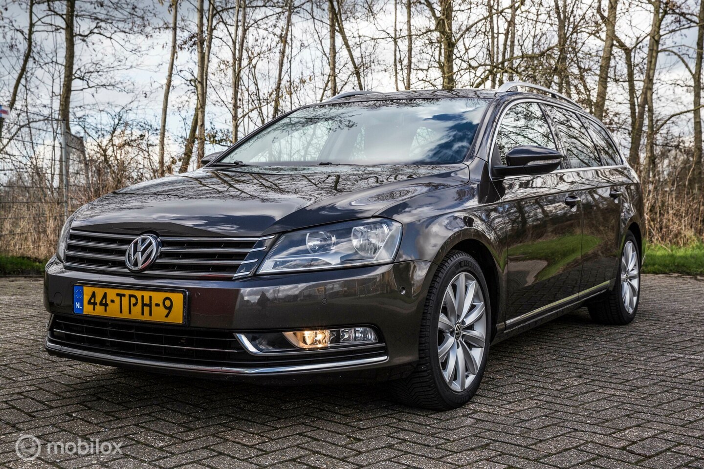 Volkswagen Passat Variant - 1.6 TDI Highline NAVI LEDER PDC CRUISE - AutoWereld.nl