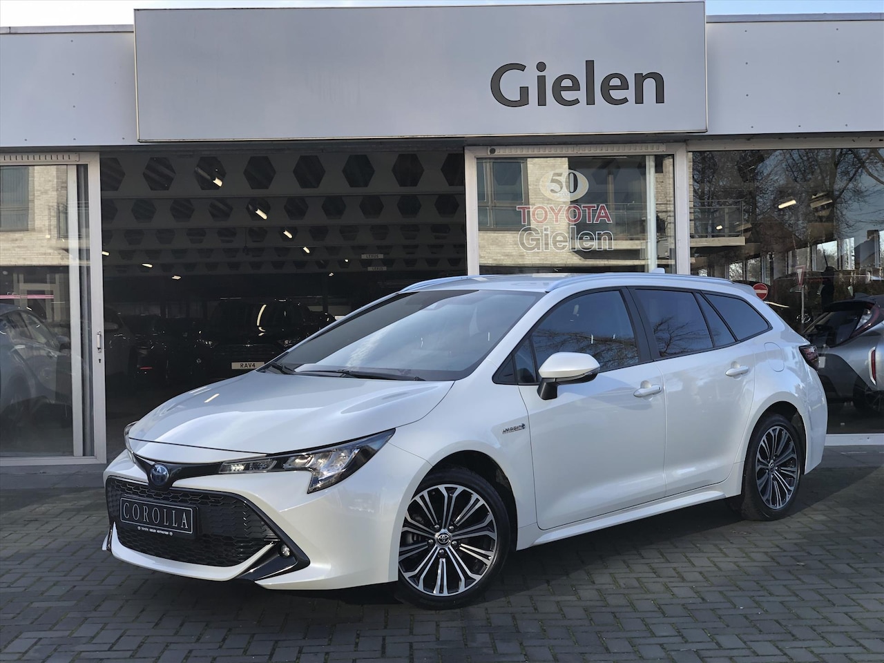 Toyota Corolla Touring Sports - 1.8 Hybrid Dynamic | Eerste eigenaar, LED, CarPlay, Parelmoer wit,17inch, Stoelverwarming, - AutoWereld.nl