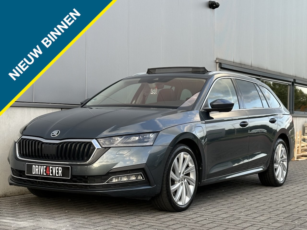 Skoda Octavia Combi - 1.4 TSI iV Sport Bns PANO NAVI HUD ELEK PAKKET CLIMATE - AutoWereld.nl