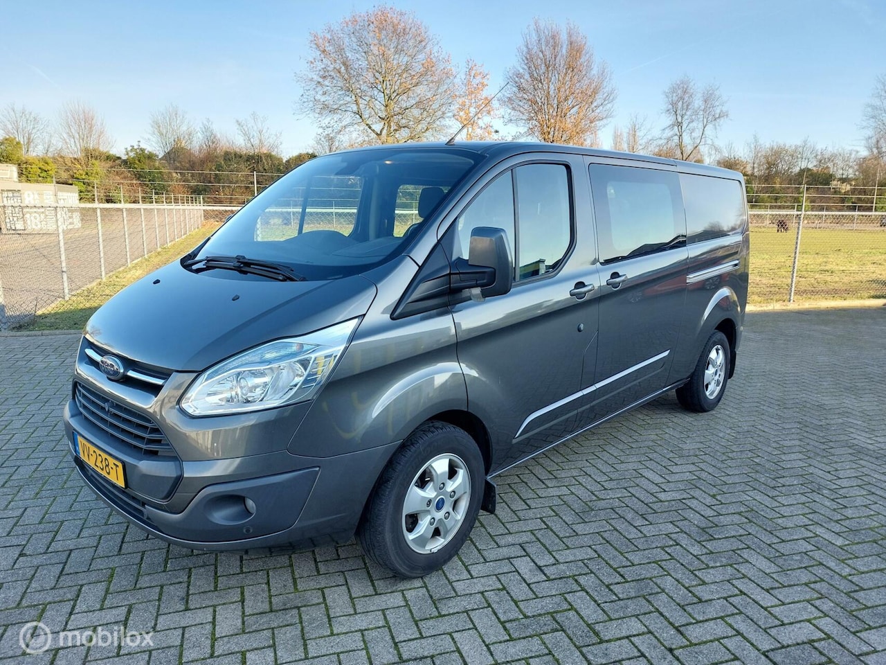 Ford Transit Custom - 2.2 TDCI 125pk L2H1 Ambiente Dubbele Cab. 1e eig. Cruise Camera NAP - AutoWereld.nl