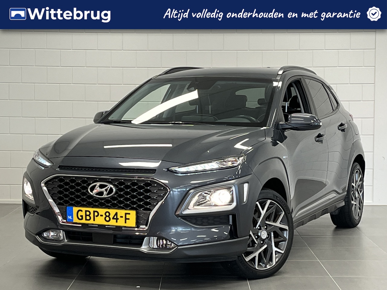 Hyundai Kona - 1.6 GDI HEV Fashion Design NAVIGATIE | HALF LEDER | 18 INCH VELGEN | STOERE CROSSOVER! - AutoWereld.nl