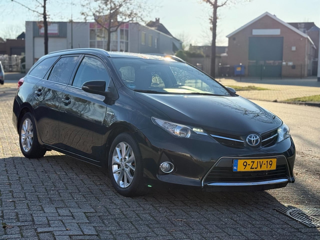 Toyota Auris Touring Sports - 1.8 Hybrid Lease / Panoramadak / Nette Auto! - AutoWereld.nl