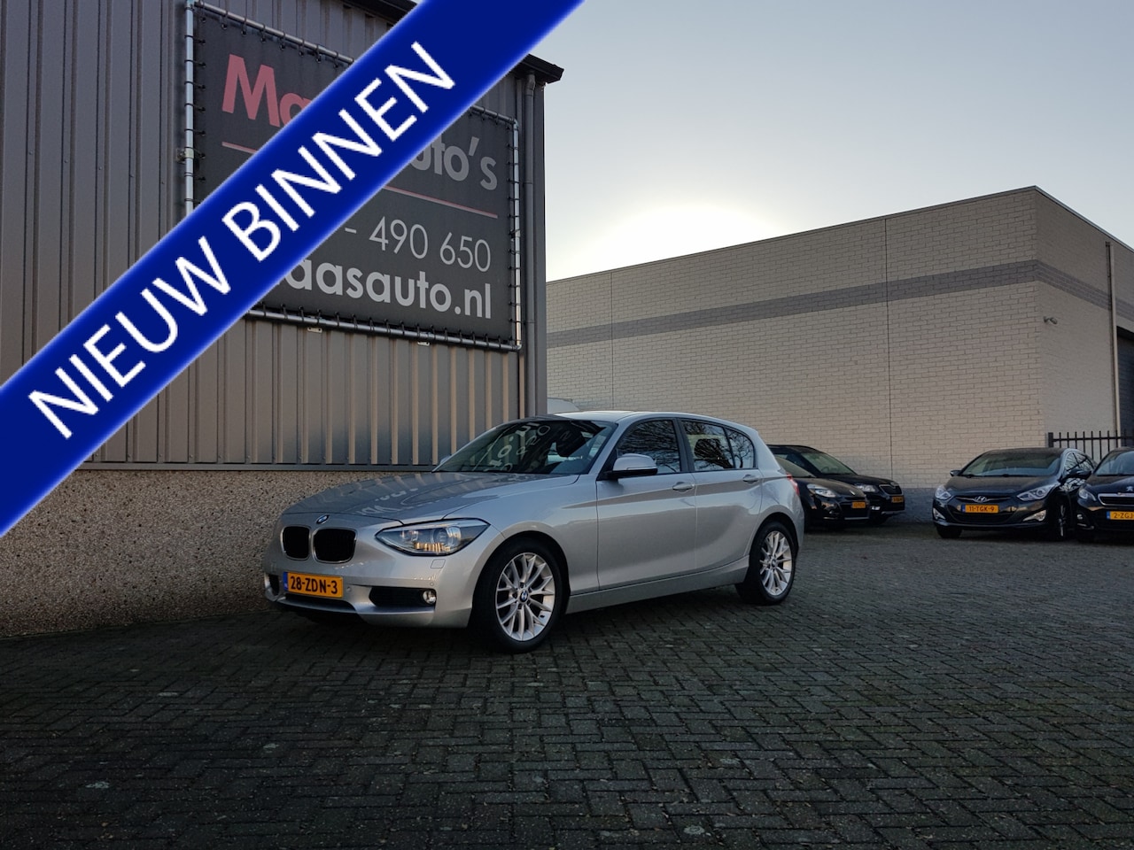 BMW 1-serie - 118i Upgrade Edition uitvoering automaat leder/schuifdak !!! - AutoWereld.nl