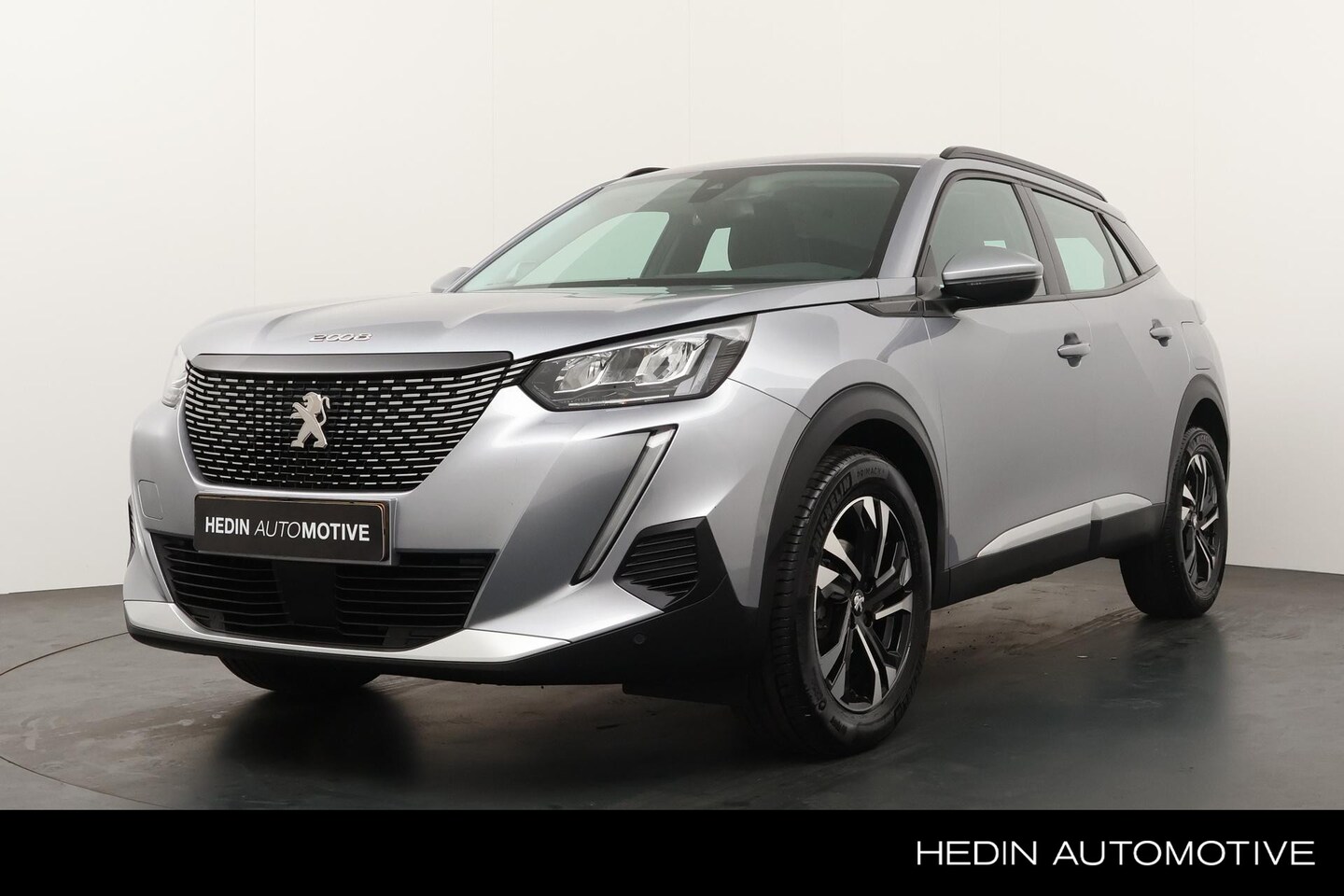 Peugeot 2008 - 1.2 100PK Allure | Navigatie via App | Camera | Climate control | Cruise control | Apple C - AutoWereld.nl