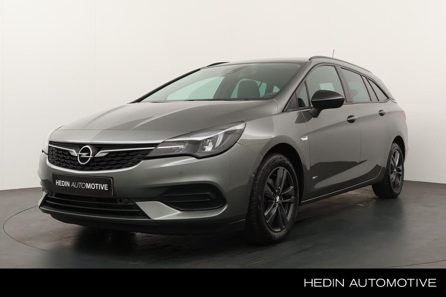 Opel Astra Sports Tourer - 1.2 130PK Business Elegance | Navigatie | Camera | AGR stoelen | Dodehoek detectie | Clima - AutoWereld.nl