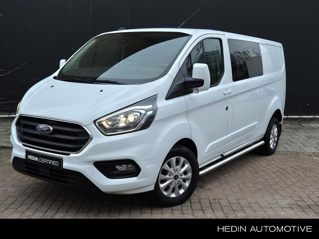 Ford Transit Custom - 300 2.0 TDCI L2H1 Limited DC | 6 Zits | Navi | Stoelverwarming | Trekhaak | LMV | - AutoWereld.nl