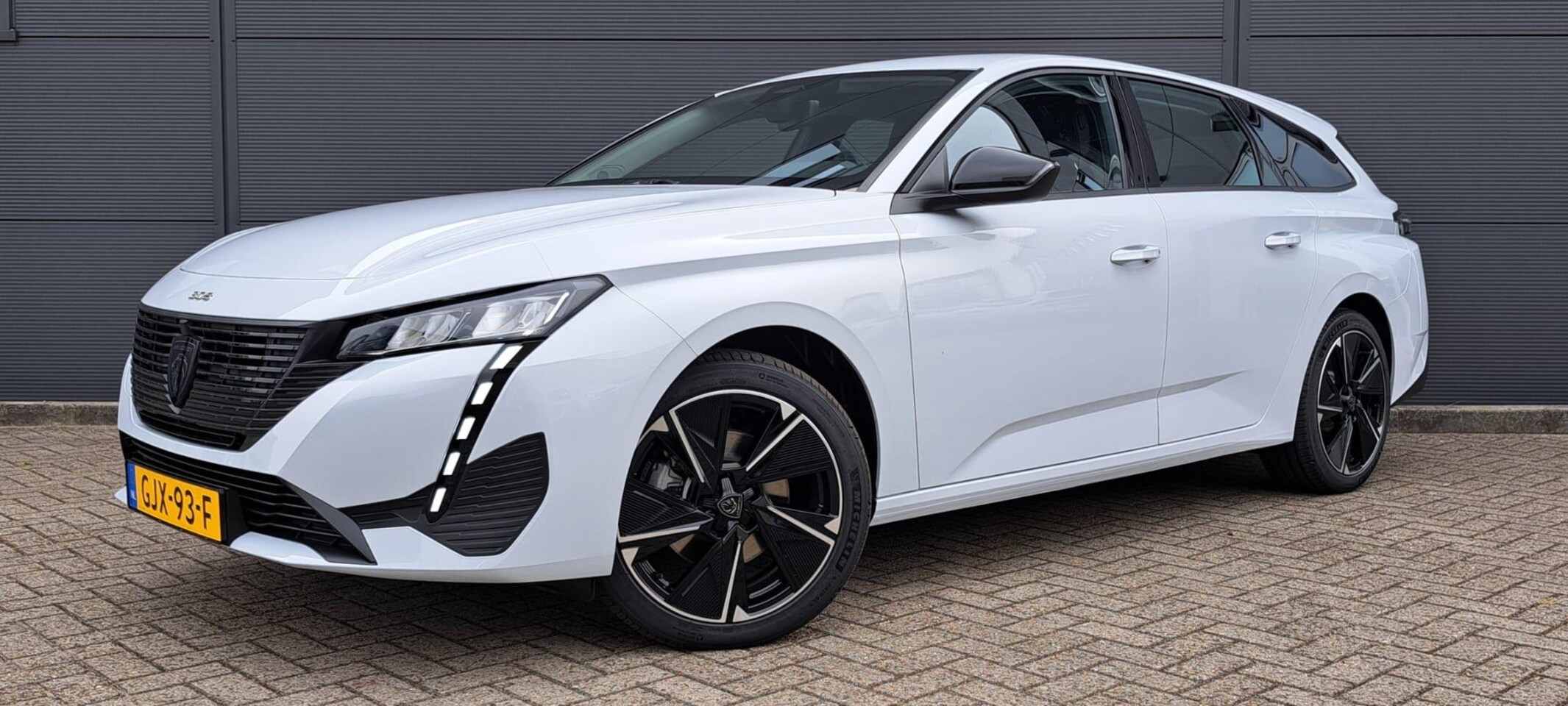 Peugeot e-308 SW - Style EV 54 kWh Climate Control | Adaptive Cruisecontrol | 18"Lichtmetalen Velgen | Apple - AutoWereld.nl