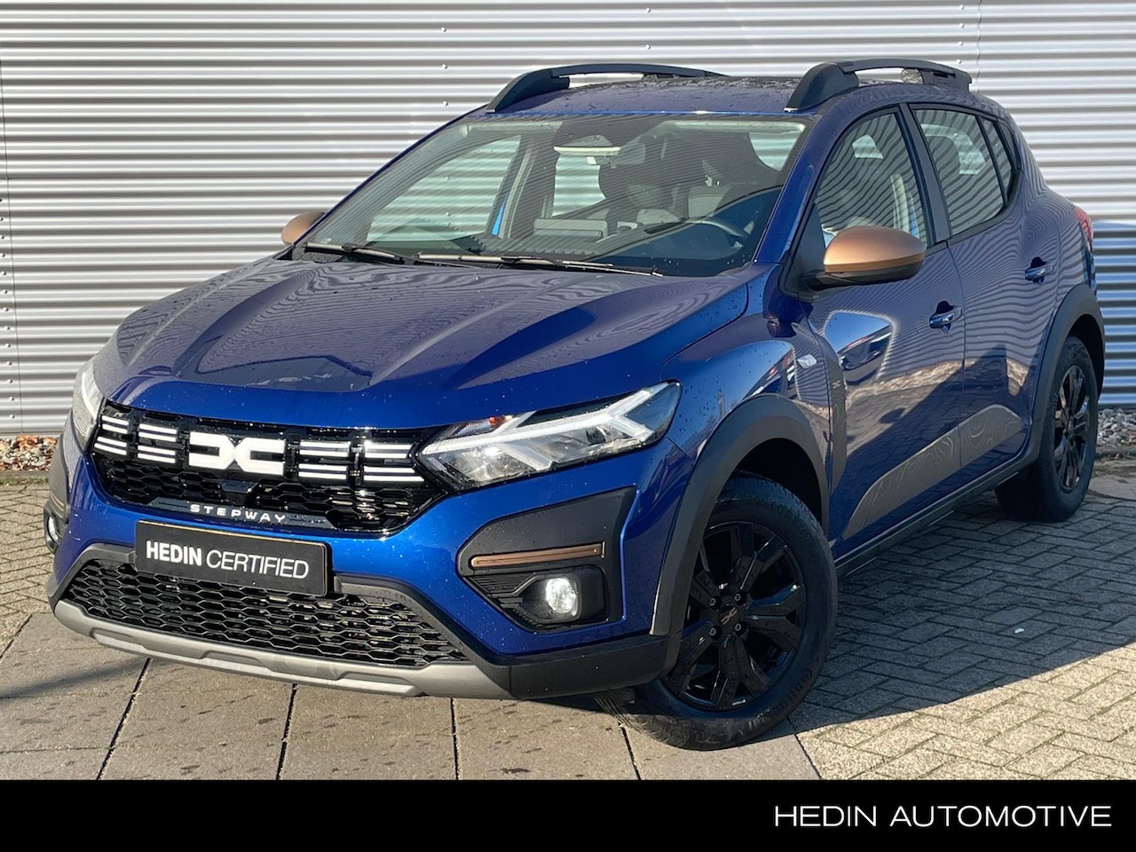 Dacia Sandero Stepway - 1.1 TCe 110 Extreme Glazen schuif-/kanteldak | Trekhaak - AutoWereld.nl