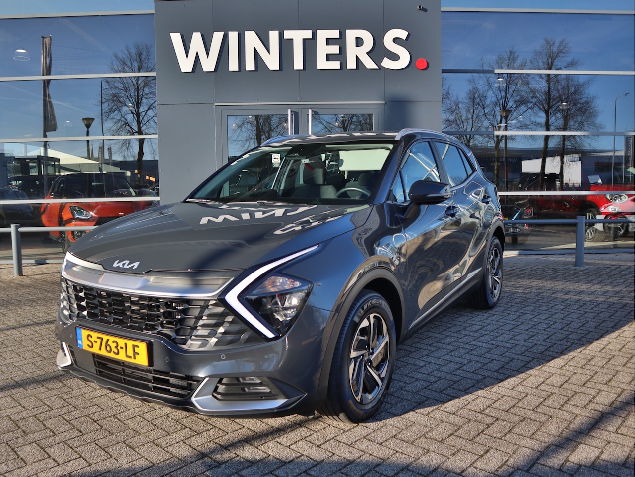 Kia Sportage - 1.6 T-GDi Hybrid DynamicLine ECC Cr.Control-Adapt. Navi+Camera BT+USB 17"LMV Trekhaak 7jr. - AutoWereld.nl