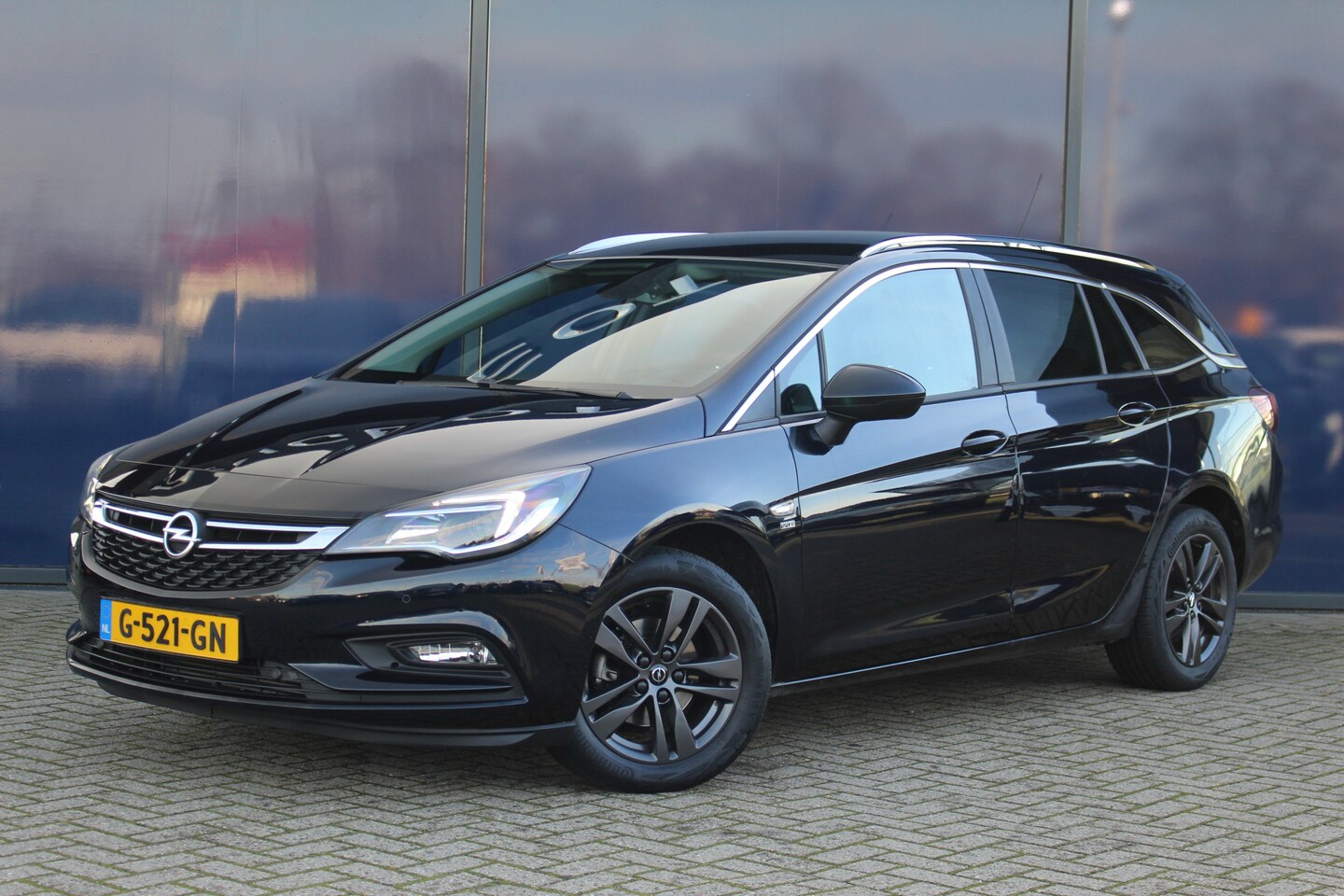 Opel Astra Sports Tourer - 1.0 Turbo 120 Jaar Ed. Navi | LED | Privacy Glass | 16" LMV | Net binnen! - AutoWereld.nl