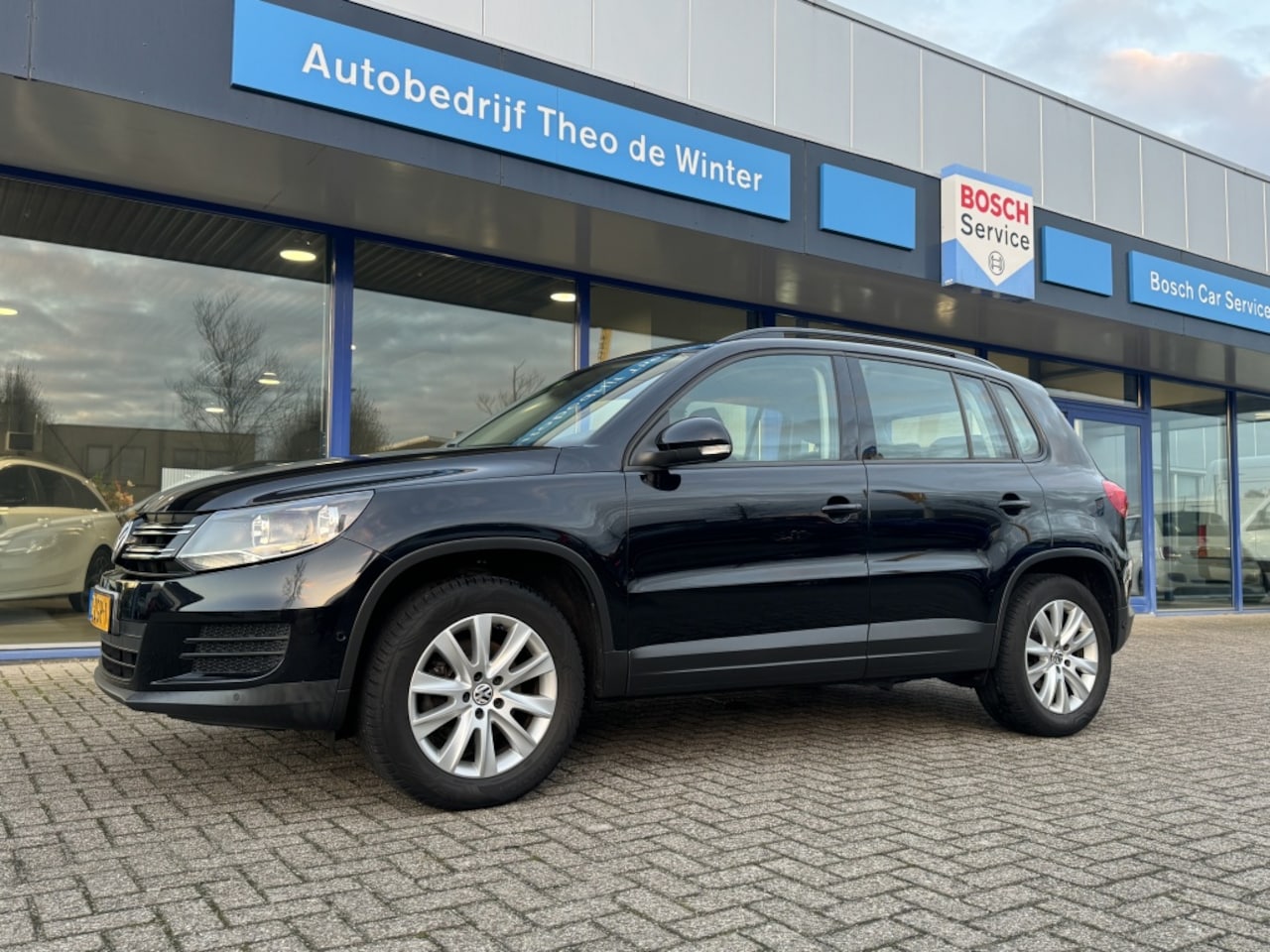 Volkswagen Tiguan - 1.4 TSI Comf.&Design| Clima, Cruise, Navi, Trekhaak - AutoWereld.nl