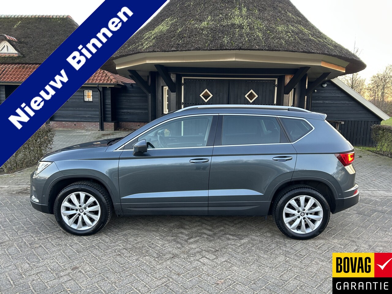 Seat Ateca - 1.0 EcoTSI Style Business Intense Camera Pdc Clima Trekhaak Navi App Nap - AutoWereld.nl