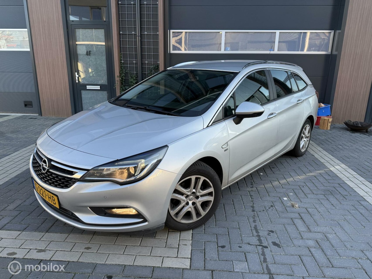 Opel Astra Sports Tourer - 1.0 Turbo 120 Jaar Edition 1.0 Turbo 120 Jaar Edition - AutoWereld.nl