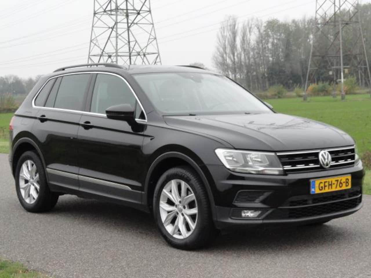 Volkswagen Tiguan - 1.4TSI 4Motion Business Met ECC+NAVIG+ELEKTR KLEP - AutoWereld.nl