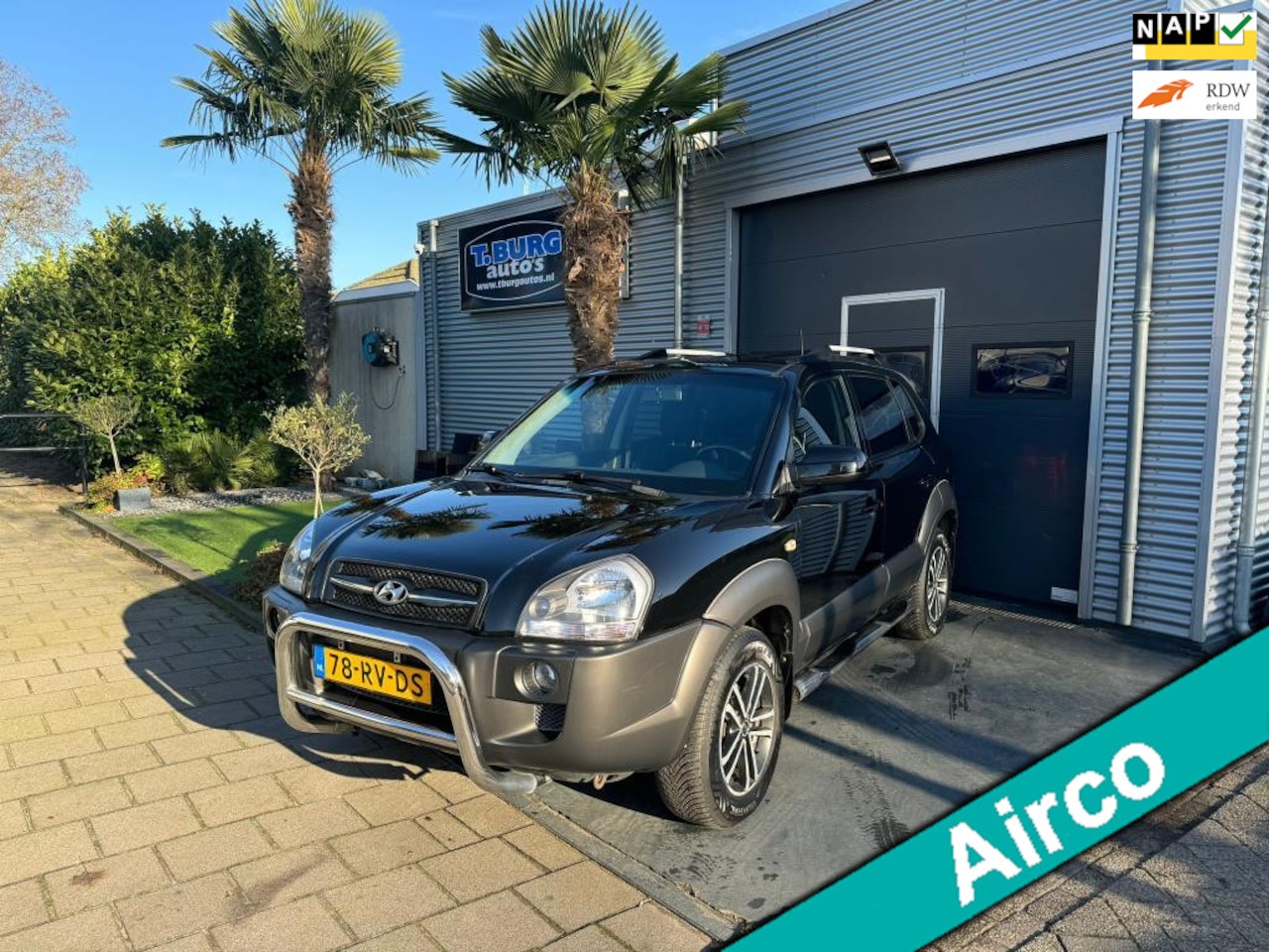 Hyundai Tucson - 2.0i Style AIRCO - AutoWereld.nl