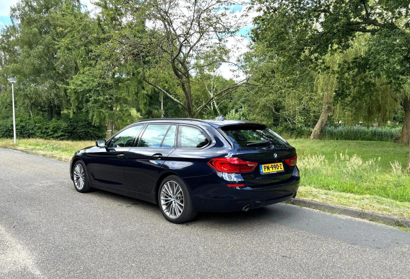 BMW 5-serie Touring - 520i SportLine G31 FACELIFT - AutoWereld.nl