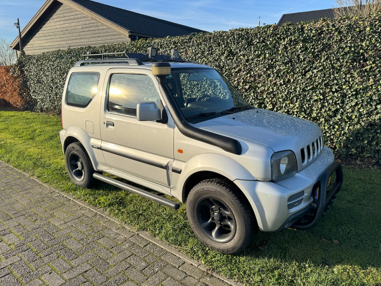 Suzuki Jimny - 1.3 JLX Airco, nieuwe APK + onderhoud, goed aangekleed - AutoWereld.nl