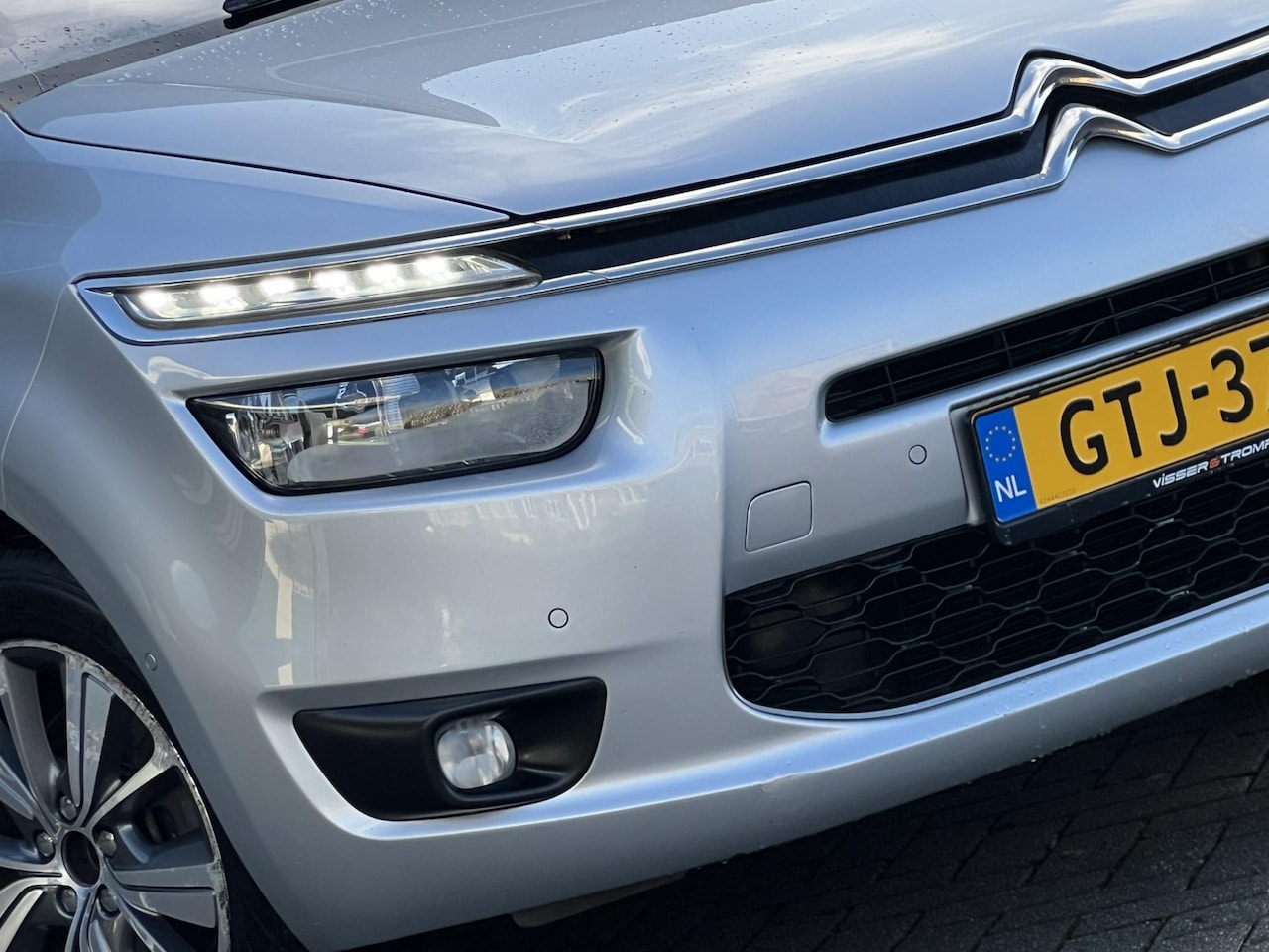 Citroën Grand C4 Picasso - 1.6 165PK Exclusive 7pers AUTOMAAT - Gris Aluminium - Leder/Pano/Clima - AutoWereld.nl