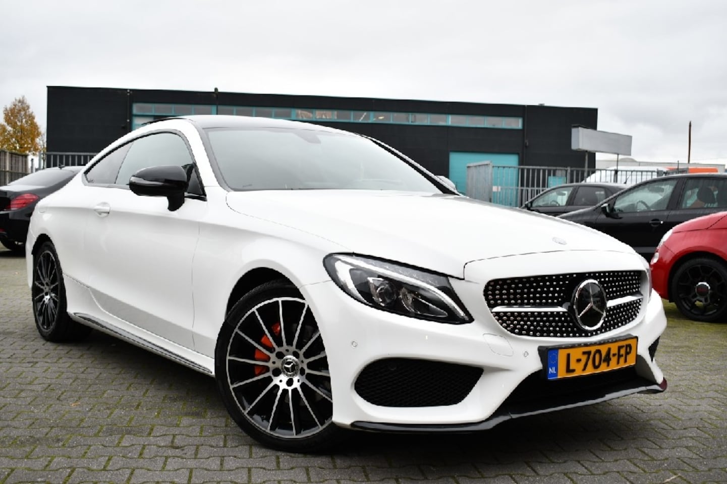 Mercedes-Benz C-klasse Coupé - 220d AMG Panodak|Keyless|19" - AutoWereld.nl