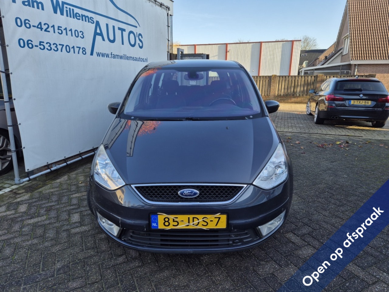 Ford Galaxy - 2.0-16V Ghia 7 persoons - AutoWereld.nl