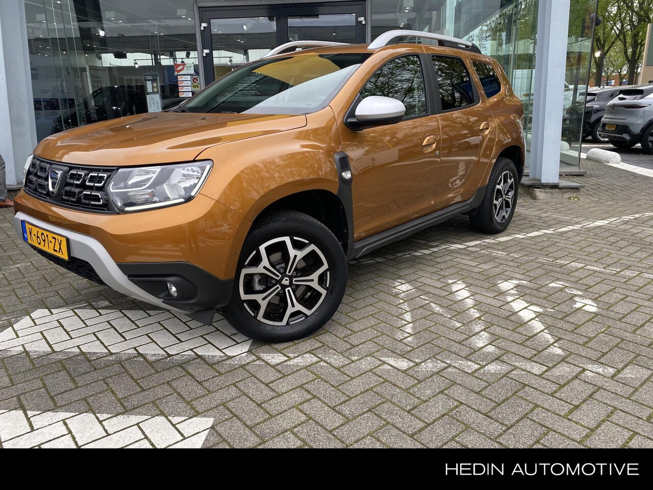 Dacia Duster - 1.0 TCe Bi-Fuel Prestige 1e eig., Nav, Airco, Bluetooth, Cruise - AutoWereld.nl