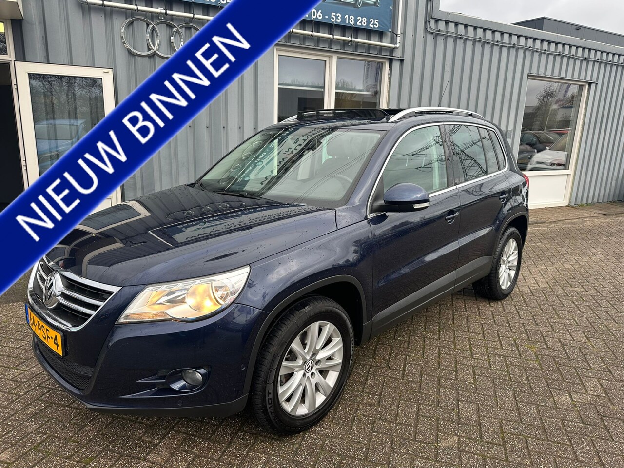 Volkswagen Tiguan - 1.4 TSI Sport&Style panoramadak - AutoWereld.nl