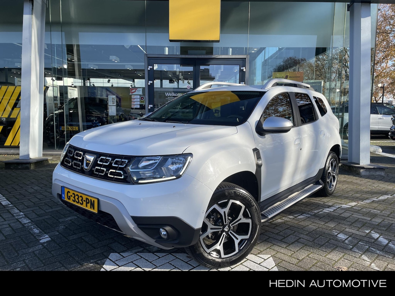 Dacia Duster - 1.3 TCe Prestige 130PK 1e.eig.,  Trekhaak, Treeplanken - AutoWereld.nl