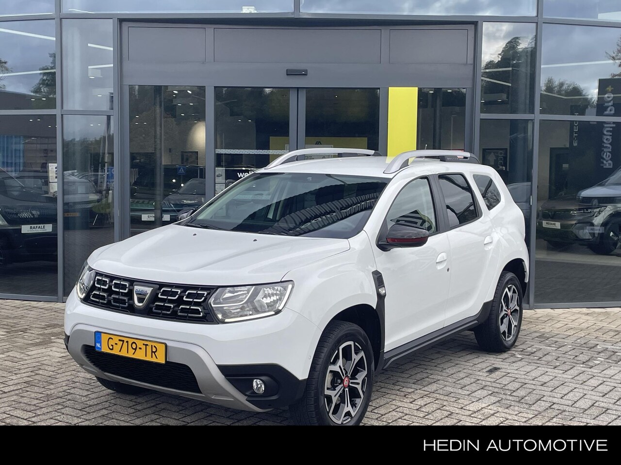 Dacia Duster - 1.3 TCe Serie Limitee Tech Road AFNEEMBARE TREKHAAK | APPLE CARPLAY/ANDROID AUTO | PARKEER - AutoWereld.nl