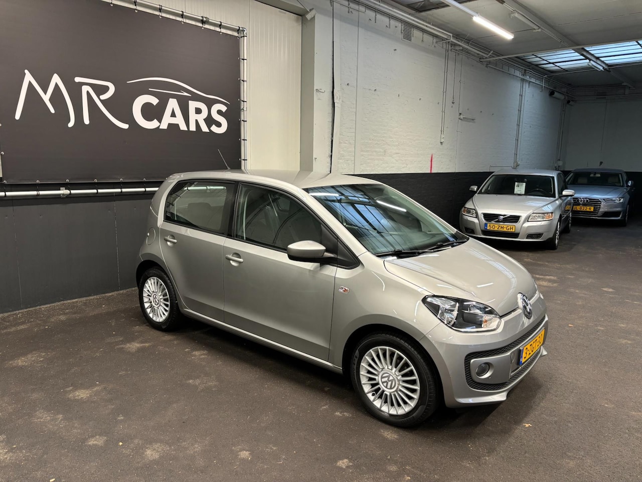 Volkswagen Up! - 1.0 high up! BlueMotion Navi/Airco/Cruise Control - AutoWereld.nl