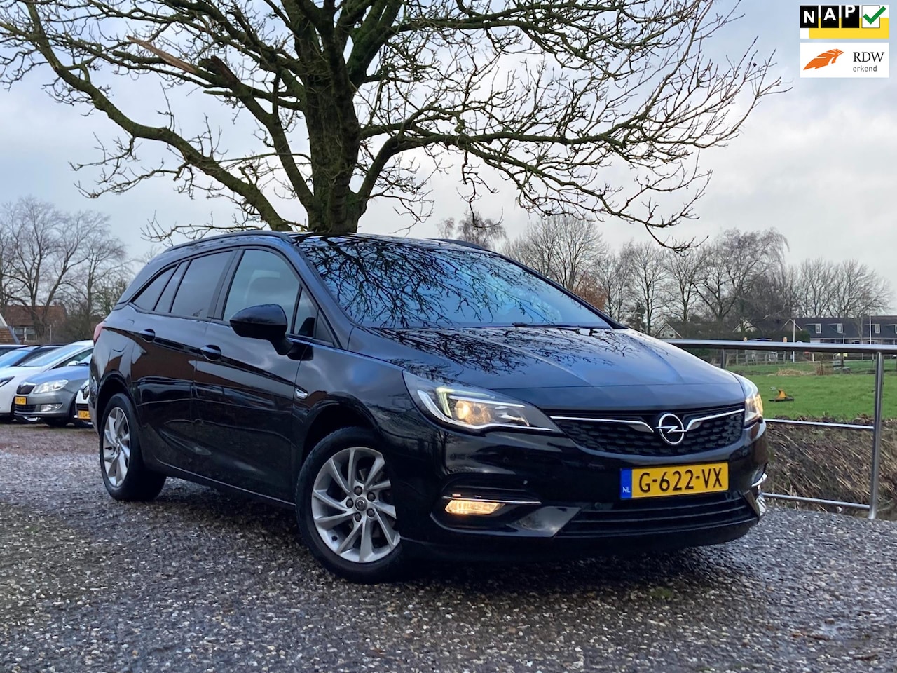 Opel Astra Sports Tourer - 1.2 Business Edition | Navi + Clima + Cruise nu €9.975,-!! - AutoWereld.nl