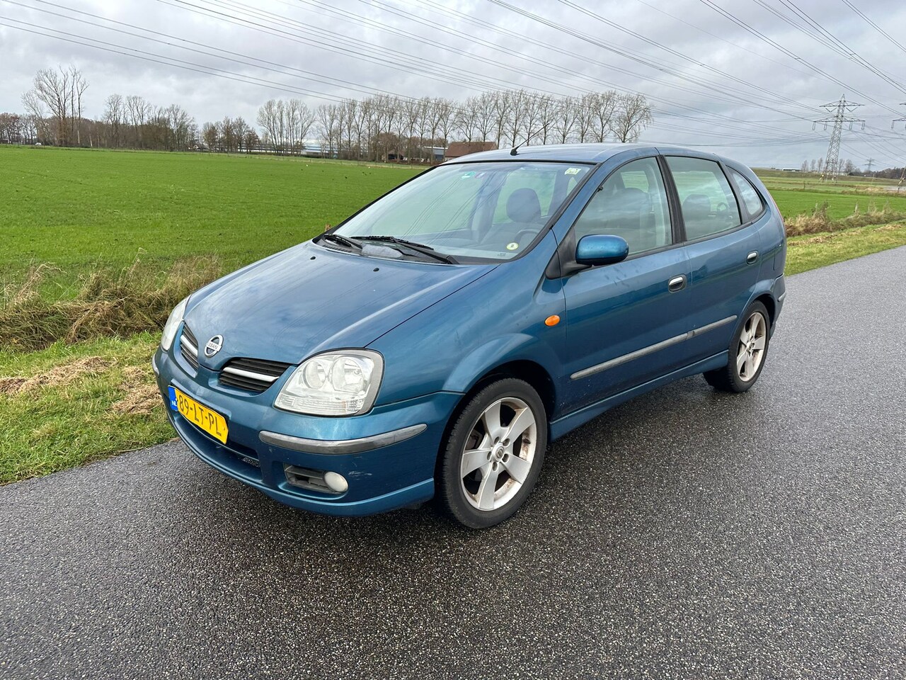 Nissan Almera Tino - 1.8 Acenta AIRCO / CAMERA ! - AutoWereld.nl