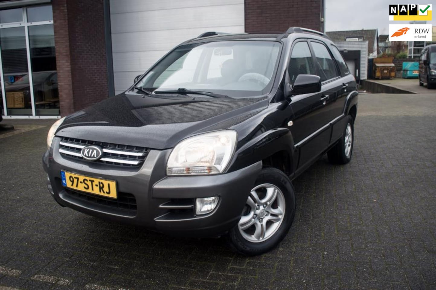 Kia Sportage - 2.0 CVVT Executive 2.0 CVVT Executive - AutoWereld.nl