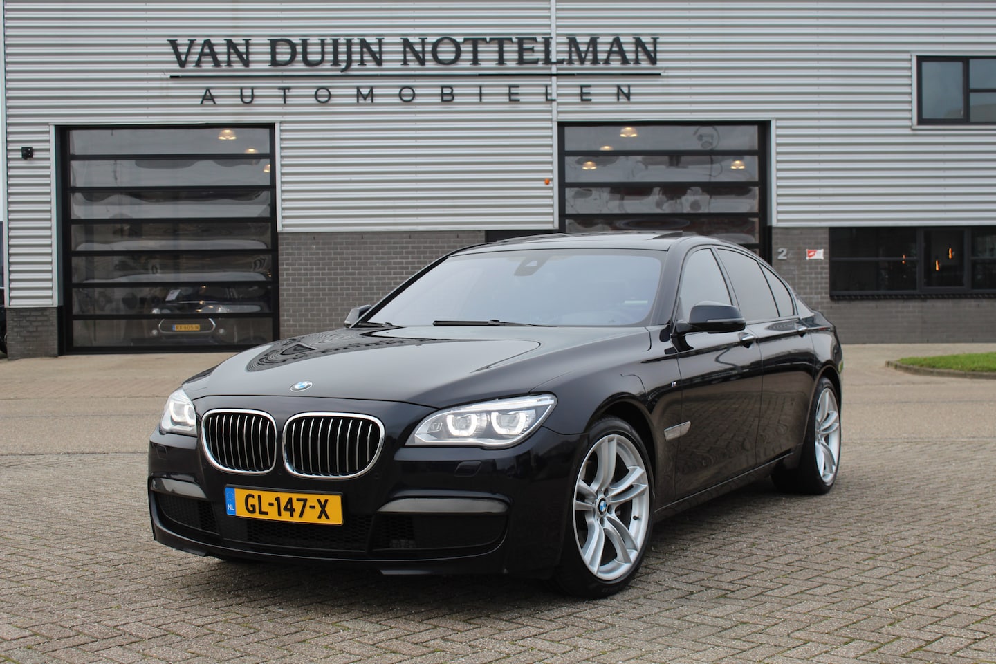 BMW 7-serie - 730d / M Sport / Panoramadak / HUD / Softclose - AutoWereld.nl