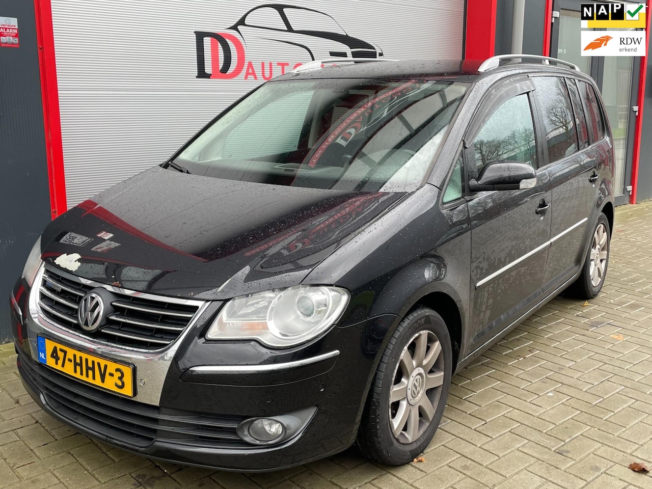 Volkswagen Touran - 1.9 TDI Highline BlueMotion PDC/CRUISE/NAVI/TREKHAAK/6BAK - AutoWereld.nl