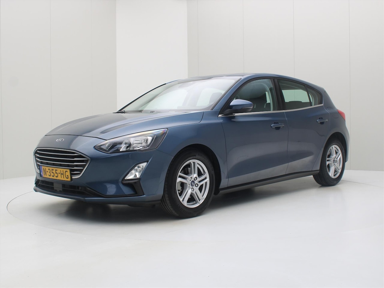 Ford Focus - 1.0 EcoBoost Hybrid 125pk 6-bak Trend Edition Business [ CARPLAY+NAVIGATIE+AIRCO+CRUISE+PD - AutoWereld.nl