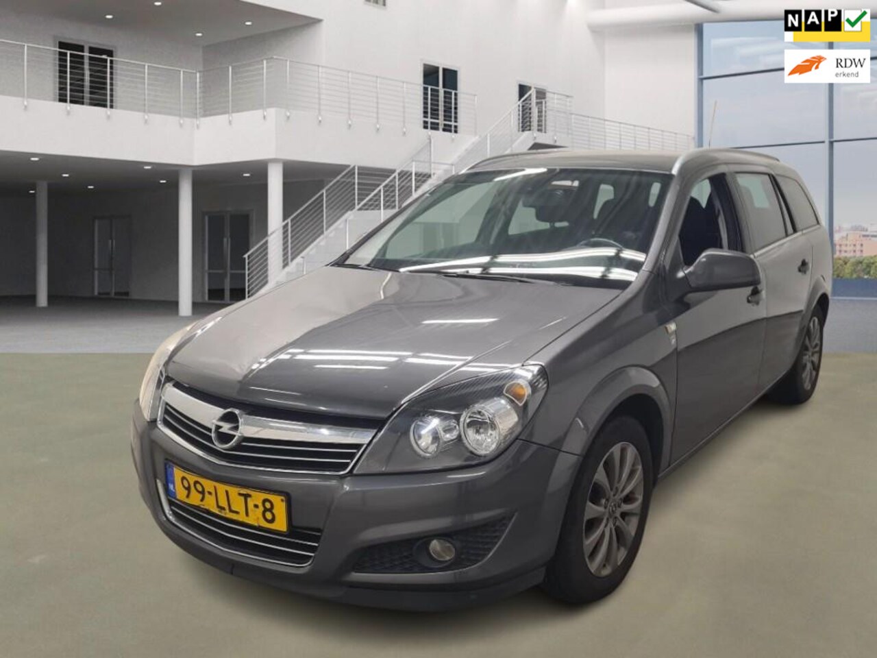 Opel Astra Wagon - 1.6 Cosmo/NAVI/PDC/CRUISE/AIRCO/ - AutoWereld.nl