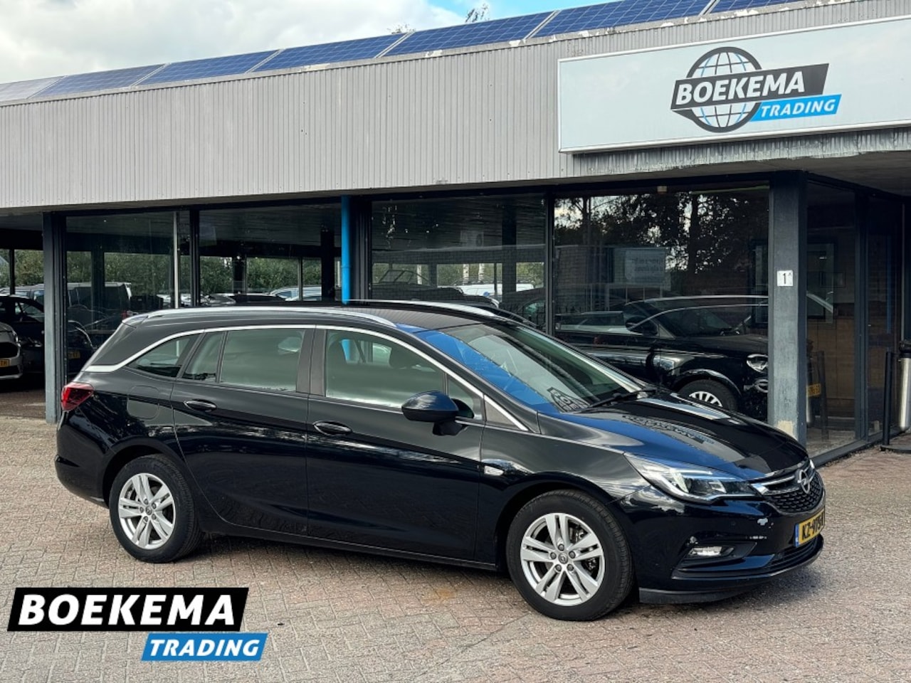 Opel Astra Sports Tourer - 1.6 CDTI Business+ Navi Clima Cruise PDC Carplay - AutoWereld.nl