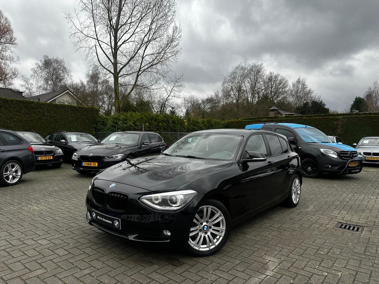 BMW 1-serie - 116i Business Sport|Nwe Ketting + Klepseals|Groot Navi|Cruise control|Airco|Sport... - AutoWereld.nl