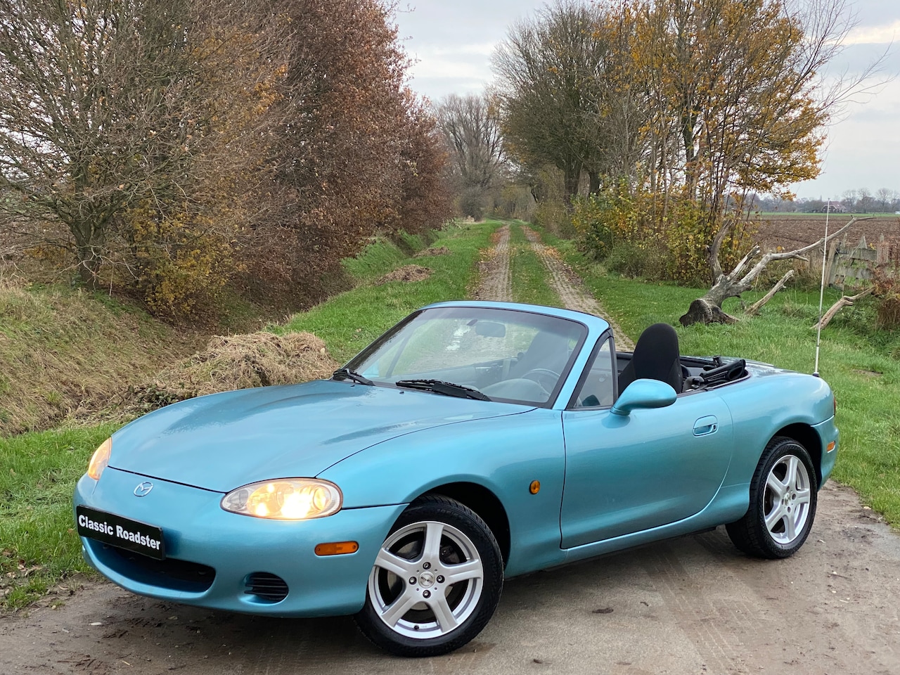 Mazda MX-5 - 1.6i Touring NBFL 110PK, CRYSTAL BLUE, NIEUW DAK! - AutoWereld.nl