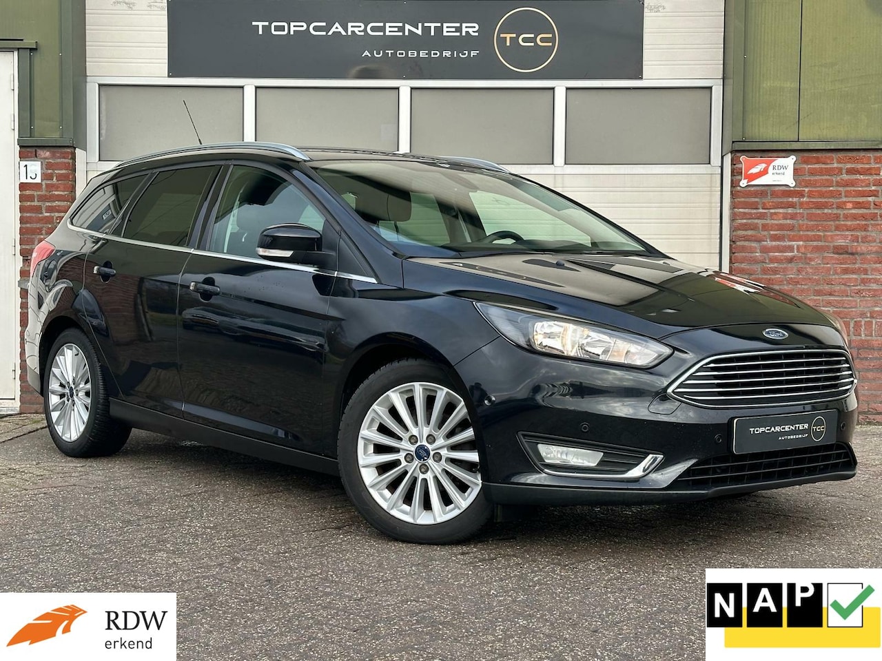 Ford Focus Wagon - 1.0 Titanium/AIRCO/TREKH/NAVI/CRUISE/APK/NAP - AutoWereld.nl