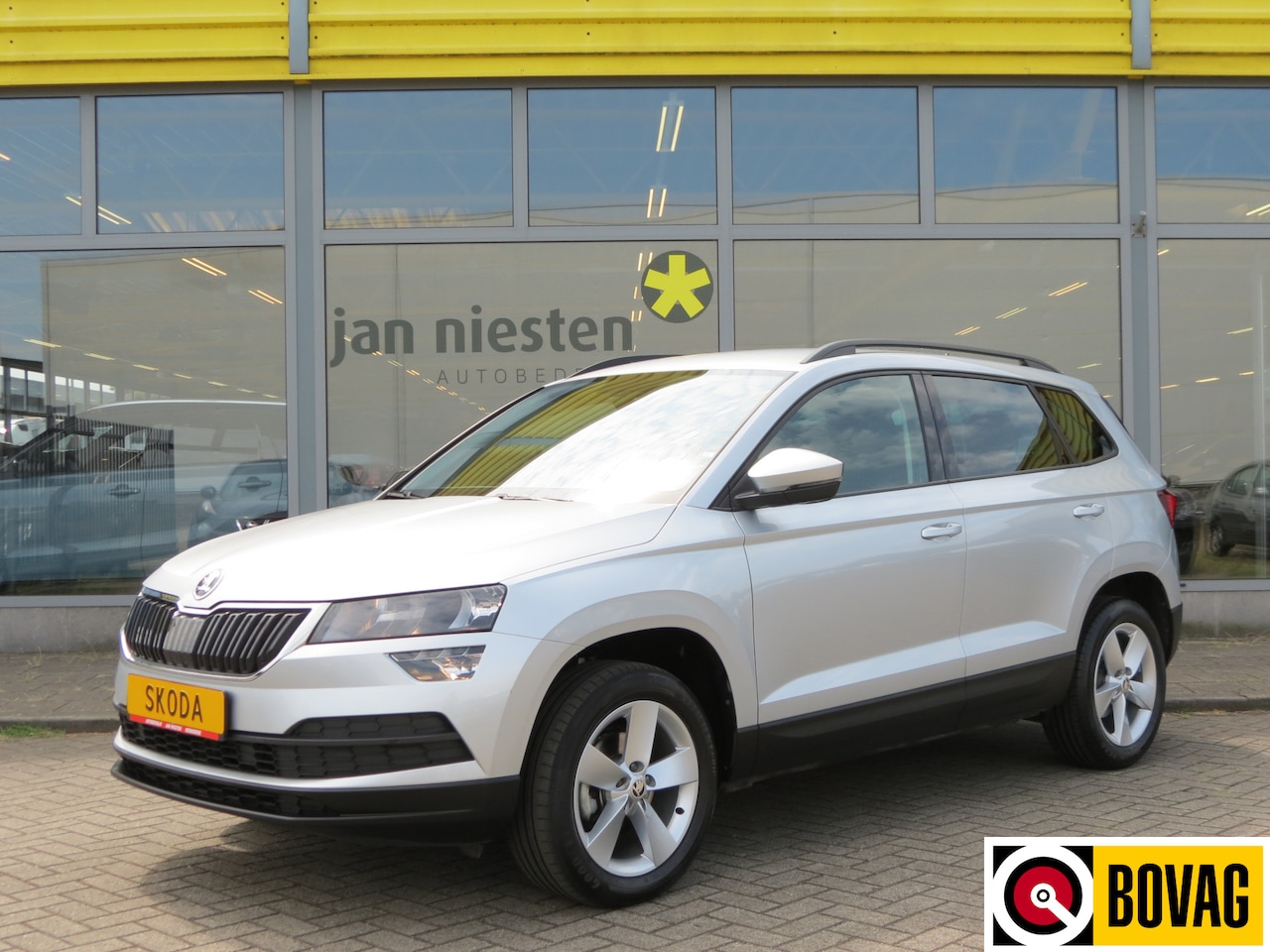 Skoda Karoq - 1.0 TSI AMBITION / NAVI / SMART LINK / 17" LMW - AutoWereld.nl