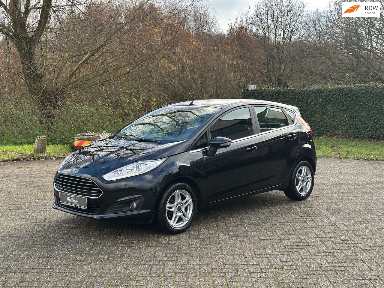 Ford Fiesta - 1.25 Titanium 82PK I COMPLEET DEALER ONDH I CLIMA I NWE APK - AutoWereld.nl