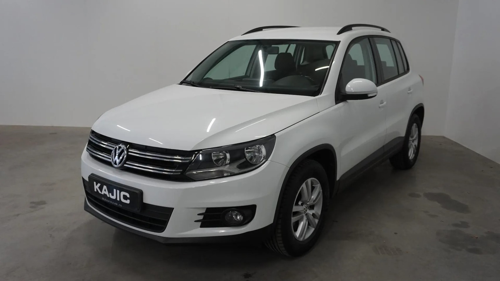 Volkswagen Tiguan - 1.4 TSI Comfort&Design Edition - AutoWereld.nl