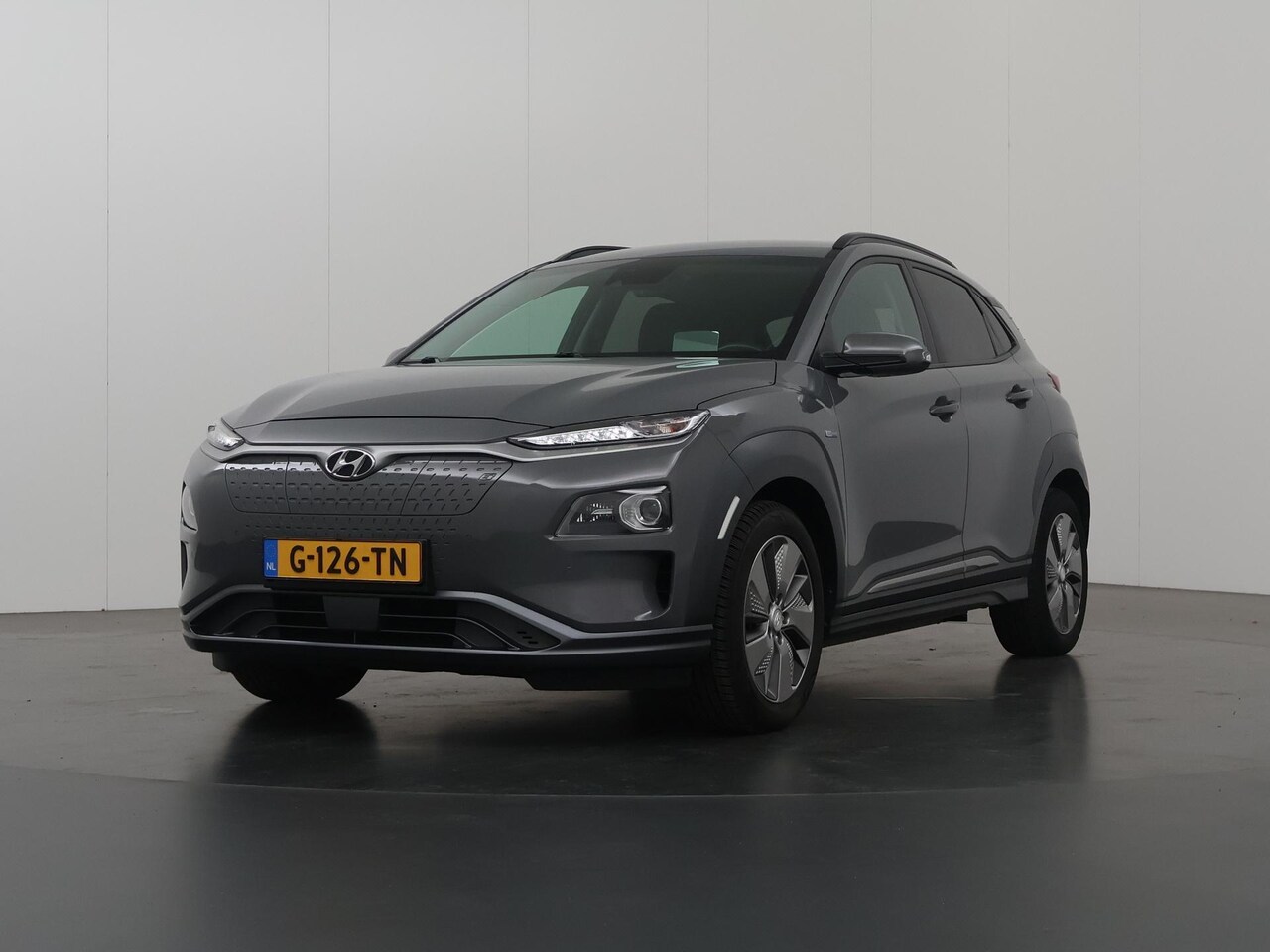 Hyundai Kona Electric - EV Premium 64 kWh | Navigatie | Krell Audio | Head-Up | Parkeercamera | Climate Control | - AutoWereld.nl