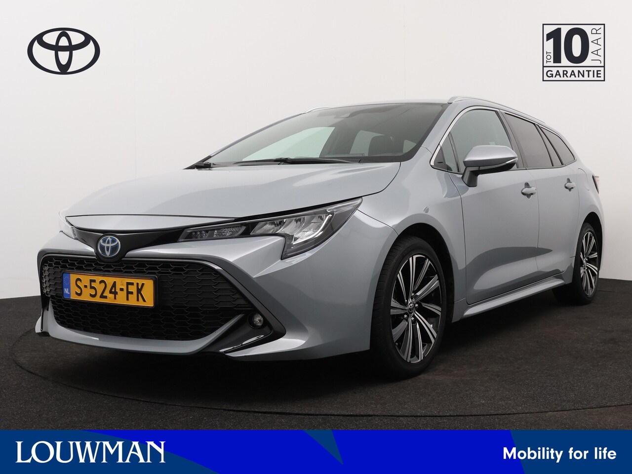 Toyota Corolla Touring Sports - 1.8 Hybrid Dynamic | Camera | Climate Control | Stoelverwarming | Draadloze telefoonlader - AutoWereld.nl